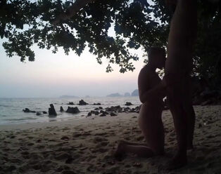 Russian young inhale on public beach after sunset