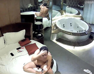Asian cuple bangs under voyeur in motel