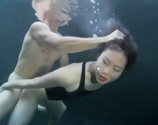 bikini damsel orgy with a boy underwater