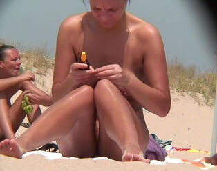Yoummy smooth-shaven cootchies on the beach filmed some dude